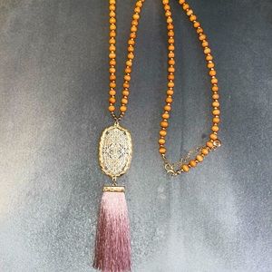 Pink beaded tassel necklace